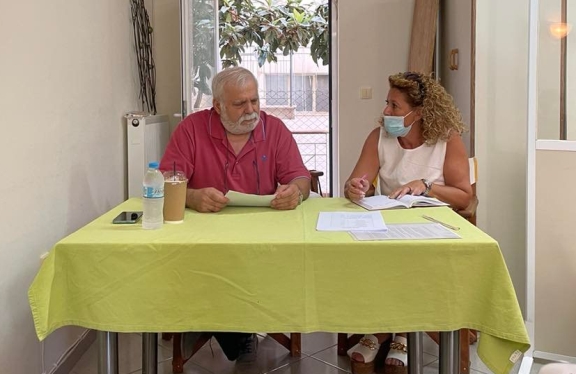 A person and person sitting at a table
AI-generated content may be incorrect.